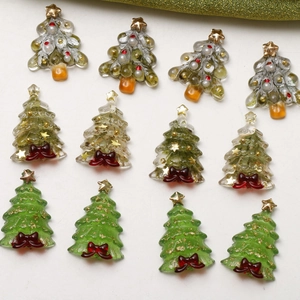 Christmas tree resin charms with gold foil stars and red bows for DIY jewelry making