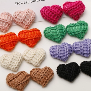 Handmade knitted heart-shaped craft accessories in eight vibrant colors for DIY hair clips