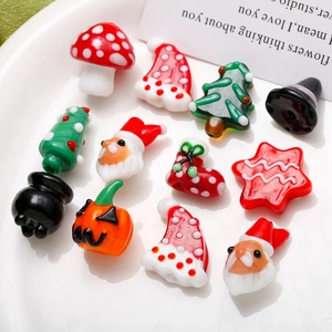 Set di perle in vetro a tema Natale e Halloween con Babbo Natale e zucche decorative
