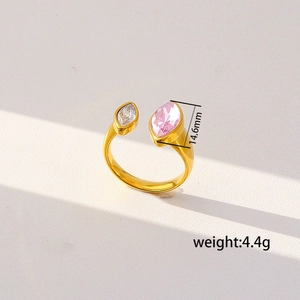 Detail view of gold open ring with marquise-cut pink and clear crystals, 14.6mm width