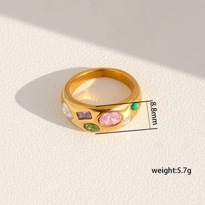 Close-up of 8.8mm wide 18k gold stainless steel ring with colorful zircon inlay