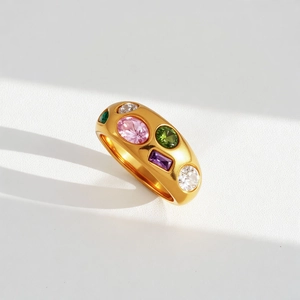 Detailed view of an 18k gold-plated dome ring featuring colorful zircon stone inlays
