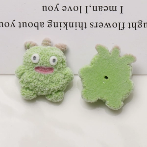 Detail view showing front and back of green flocked dog monster resin DIY accessories