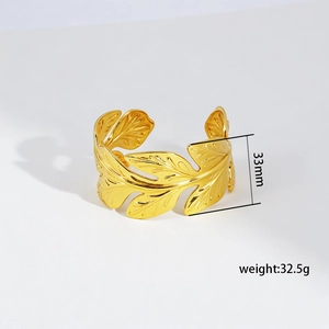 Detail of adjustable gold leaf cuff bracelet with realistic vein texture and dimensions