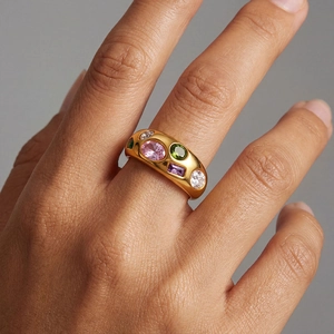 Polished 18k gold stainless steel dome ring with colorful zircon stones on finger