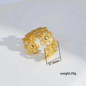 Detail shot of heavy floral texture titanium steel adjustable cuff with 37.4mm width