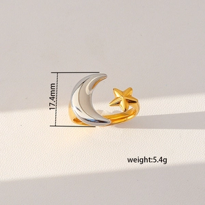 Macro shot of celestial moon and star ring with 17.4mm height and 5.4g weight specs