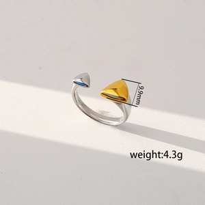 Detail view of two-tone croissant ring with 9.9mm width and 4.3g weight specifications