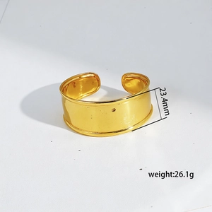 Detail view of gold titanium steel wide cuff bracelet with 23.4mm width dimension