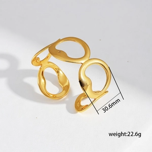 Macro detail of gold irregular oval hollow links cuff bracelet with 30.6mm width