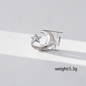 Detailed view of silver star and moon ring with 17.5mm height and 5.3g weight specs