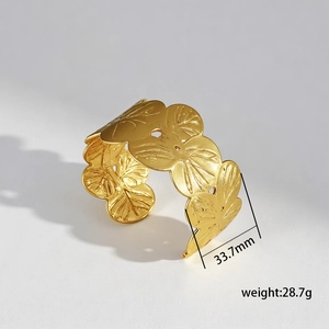 Detail shot of golden flower texture cuff bracelet with 33.7mm width and 28.7g weight