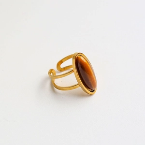Anillo vintage de acero dorado con piedra ojo de tigre ovalada y diseño ajustable
