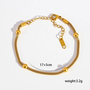 Detail view of 304 stainless steel gold bead bracelet with lobster clasp and chain