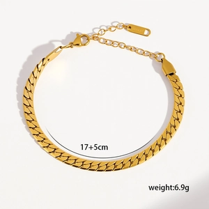 Detailed view of golden flat snake chain bracelet with adjustable lobster clasp and tag