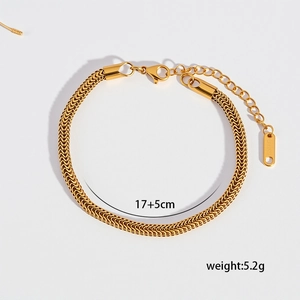 Detail view of gold 304 stainless steel snake chain bracelet with lobster clasp and tag