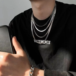 Minimalist silver multi-layered stainless steel snake chain necklace for street style.