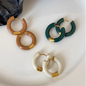 Retro titanium steel hoop earrings in brown, deep green, and cream white enamel finishes