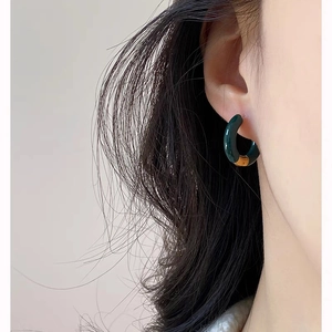French vintage dark green enamel C-shaped hoop earrings with gold metal accents