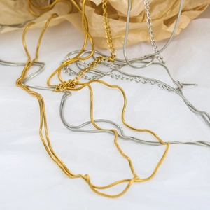 Minimalist double layer snake chain belly jewelry made of golden and silver stainless steel