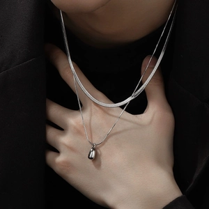 Double layered silver titanium steel necklace with drop pendant and flat snake chain