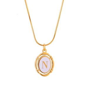 Gold oval pendant necklace with letter N and purple enamel on a sleek snake chain