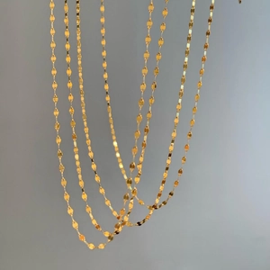 Elegant gold double layered lip snake bone chain necklace for women in luxury finish