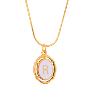 Gold oval letter R pendant necklace with purple enamel background and snake chain