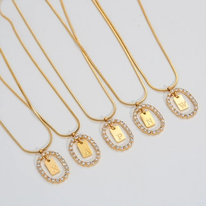 Gold stainless steel initial necklaces with sparkling rhinestone frame pendant collection