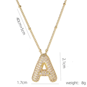 Macro shot of gold-plated balloon letter A pendant with pave zircon and size dimensions