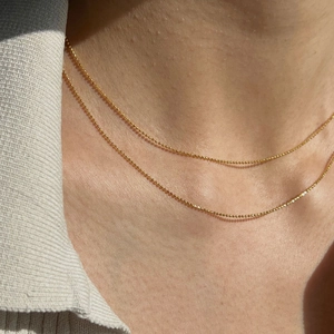 Minimalist double layered gold ball chain necklace for women in polished stainless steel