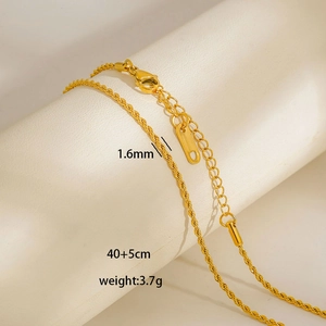 Detail of 1.6mm gold rope chain necklace showing lobster clasp and 40+5cm length