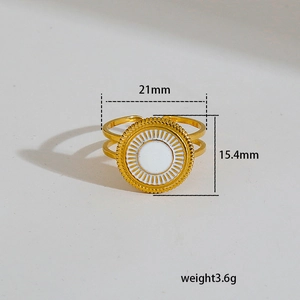 Golden titanium steel ring with white enamel circle and vintage sunburst engraving