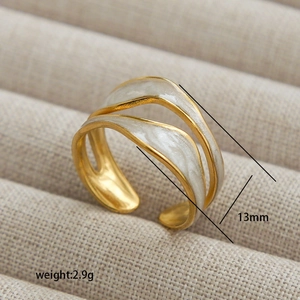 Adjustable wavy gold-plated stainless steel open ring with white enamel inlay