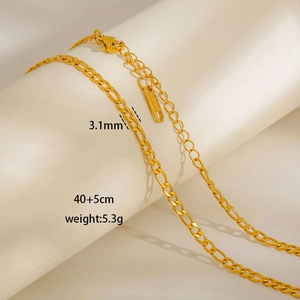 Close-up of 3.1mm golden Figaro necklace with S.Steel engraving and lobster clasp
