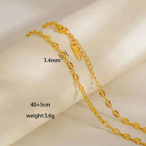 Detail of 3.4mm gold stainless steel disc chain necklace with size tags and measurements
