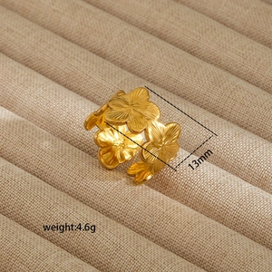 Macro shot of 18K gold plated irregular flower ring featuring detailed petal textures