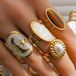 Vintage gold plated stainless steel adjustable rings with shell and pearl details