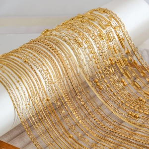 Collection of gold stainless steel necklaces and bracelets with various chain styles