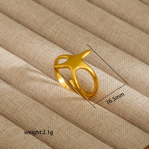 Detailed macro view of an 18K gold-plated irregular starfish ring on a velvet tray