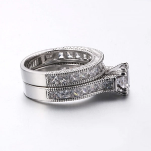 Elegant white gold plated bridal set with marquise cut cubic zirconia in four-prong setting