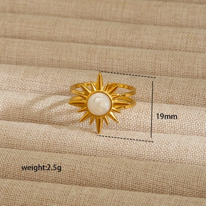 Detail of 18K gold plated sunburst ring with shell inlay and size measurement