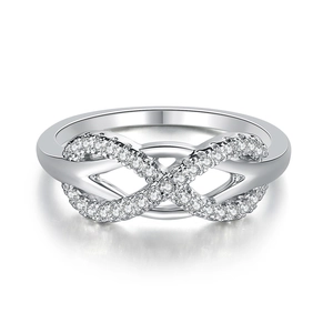 Macro detail of infinity ring with micro-pave cubic zirconia on silver plating