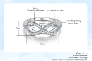 Detail view of infinity bow ring with 18K white gold plating and AAA+ cubic zirconia