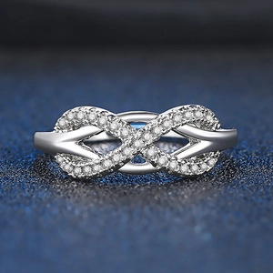 Polished silver infinity ring for women with pave-set sparkling cubic zirconia accents