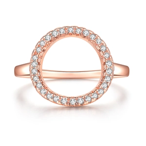 Detailed view of rose gold hollow circular ring set with shimmering cubic zirconia