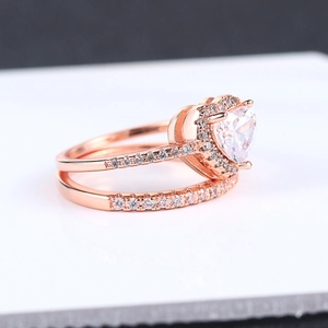 Elegant rose gold heart-shaped ring set with brilliant micro-pave cubic zirconia stones