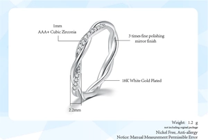 Detalle de anillo trenzado bañado en oro blanco 18K con circonita cúbica AAA+ 1mm