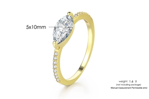 Detail view of 14K gold plated ring with a 5x10mm marquise-cut stone and pavé accents