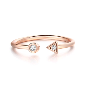 Detail view of rose gold open ring with geometric zircon insets and polished finish